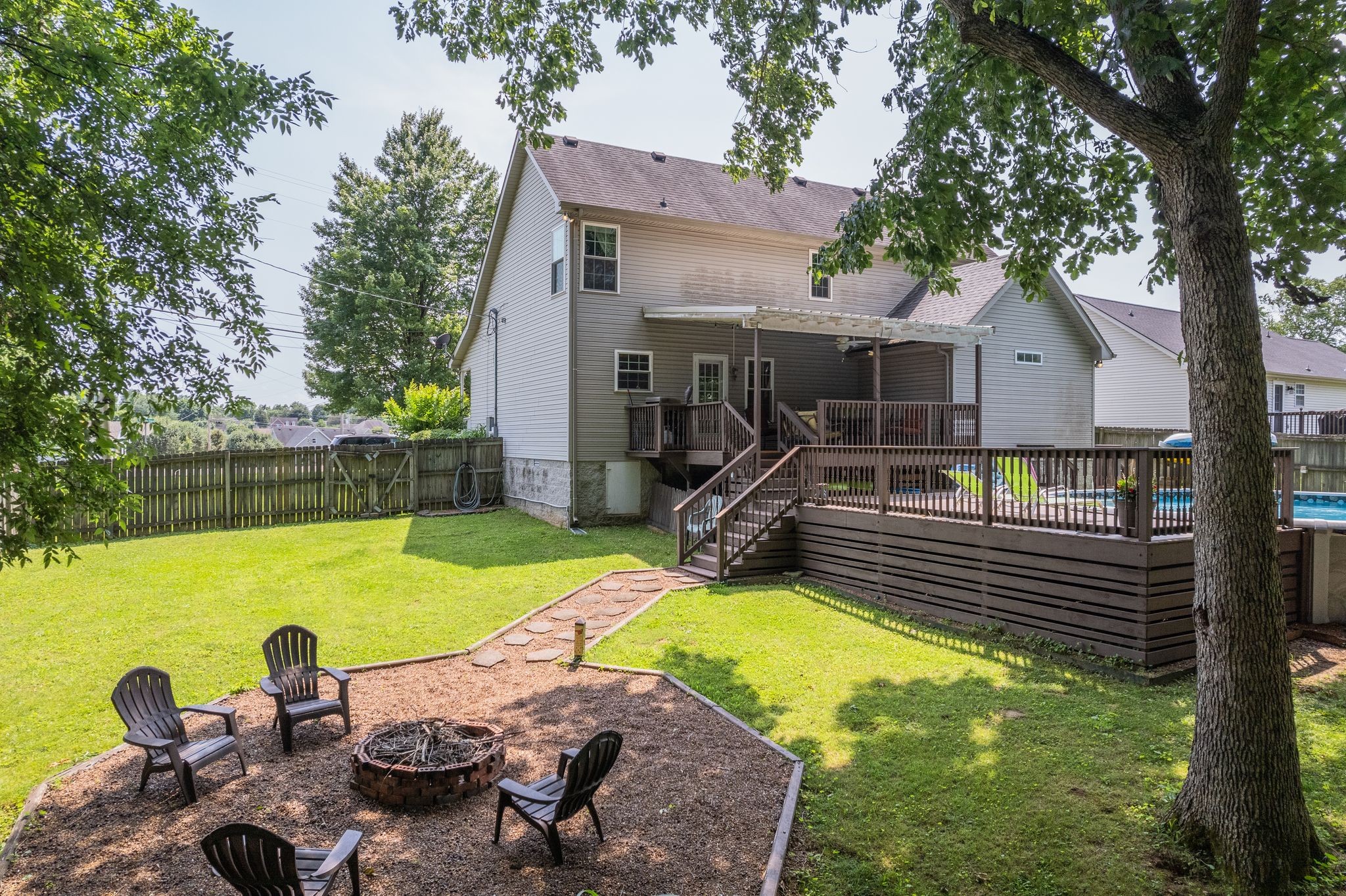1040 Windtree Trace Mount Juliet, TN 37122 - Photo 28 of 30 a view of a swimming pool with a patio