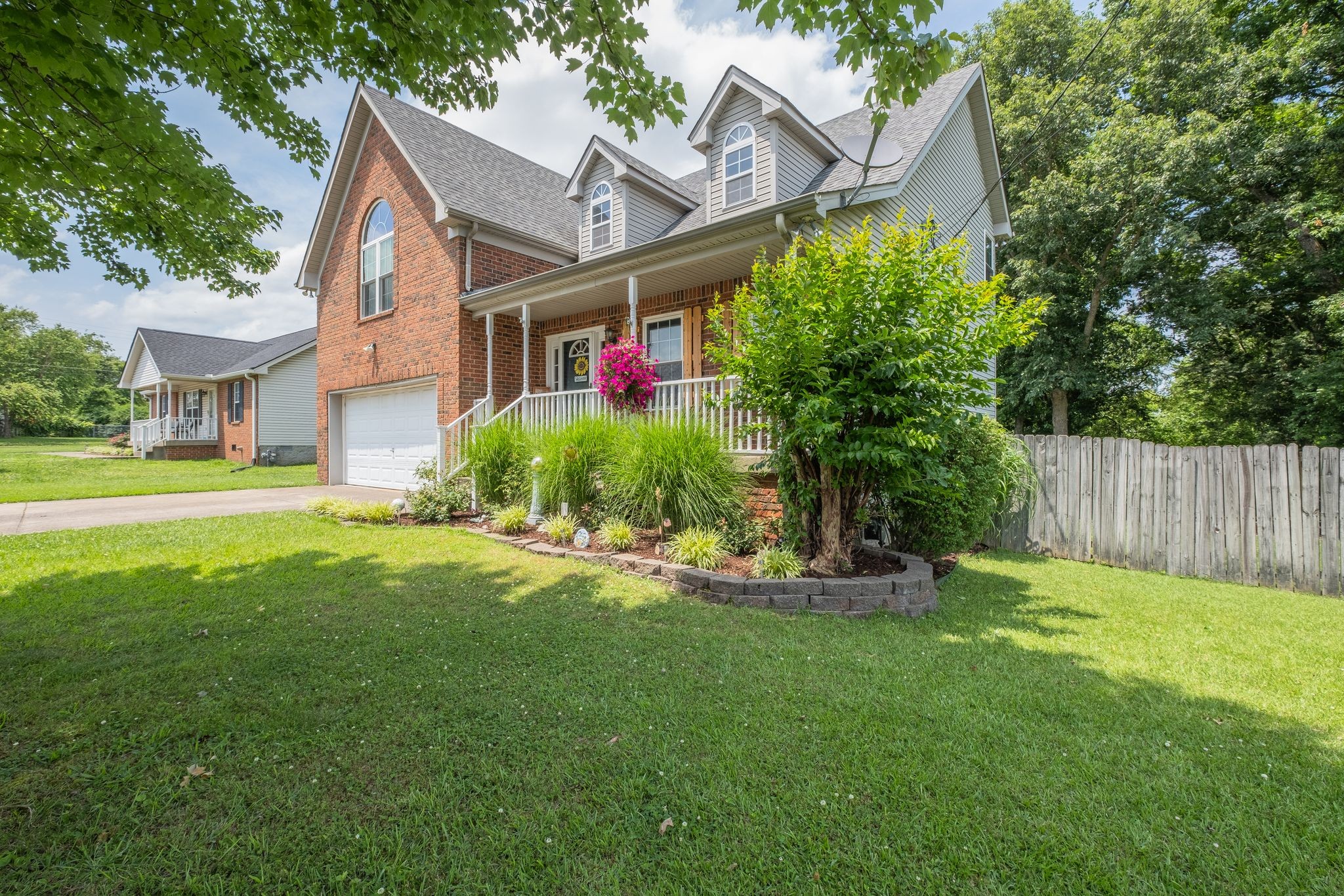 1040 Windtree Trace Mount Juliet, TN 37122 - Photo 3 of 30 a front view of house with yard and green space