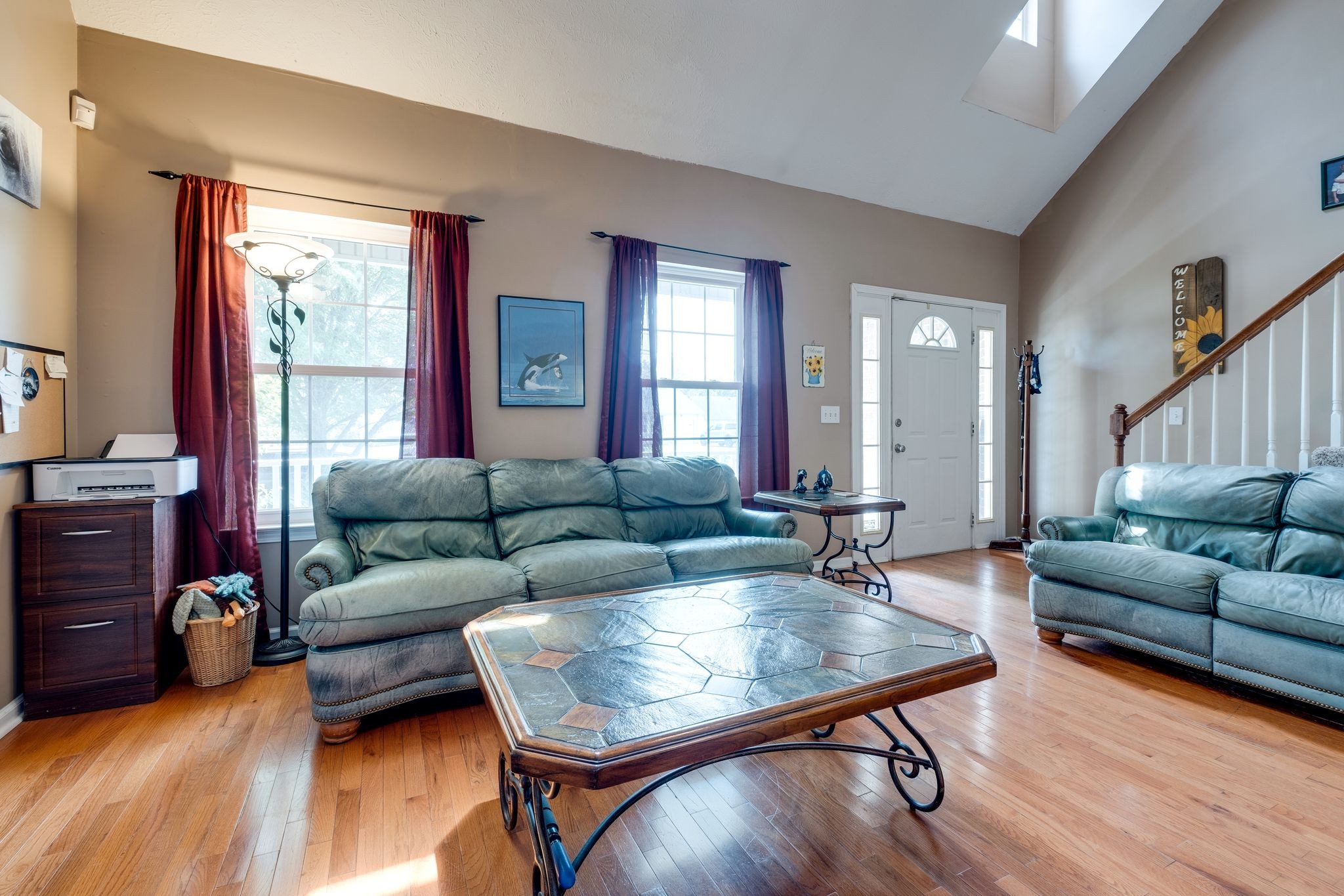 1040 Windtree Trace Mount Juliet, TN 37122 - Photo 7 of 30 a living room with furniture a wooden floor and a large window