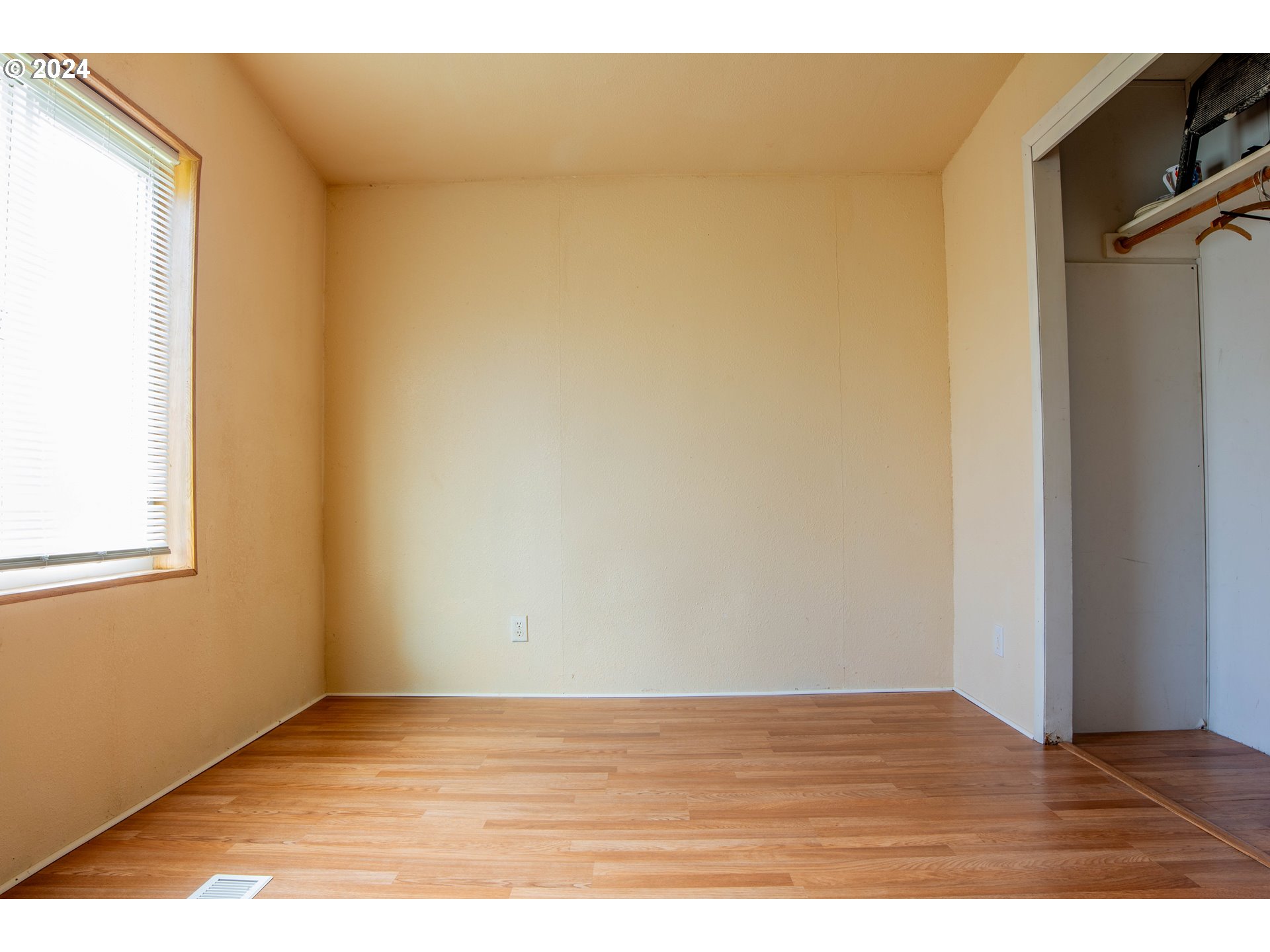 2151 Three Lakes Road Southeast, Unit 17 Albany, OR 97322 - Photo 16 of 34 a view of an empty room and wooden floor