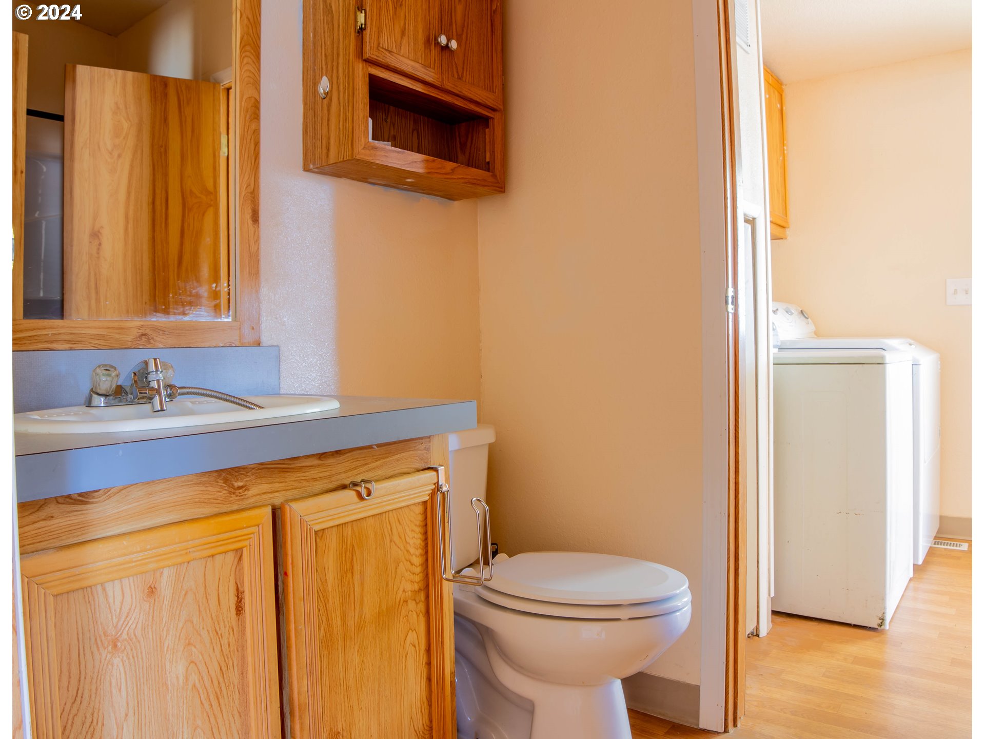 2151 Three Lakes Road Southeast, Unit 17 Albany, OR 97322 - Photo 18 of 34 a bathroom with a sink and a toilet