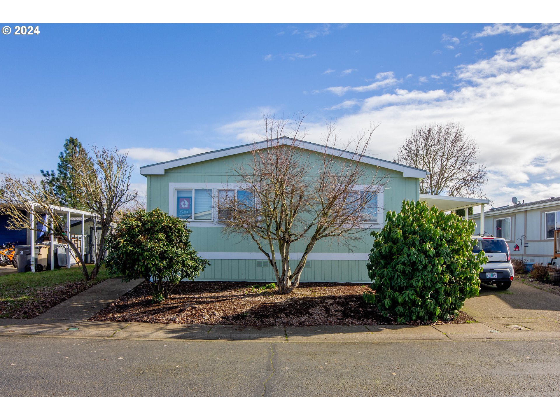 2151 Three Lakes Road Southeast, Unit 17 Albany, OR 97322 - Photo 2 of 34 a front view of a house with garden