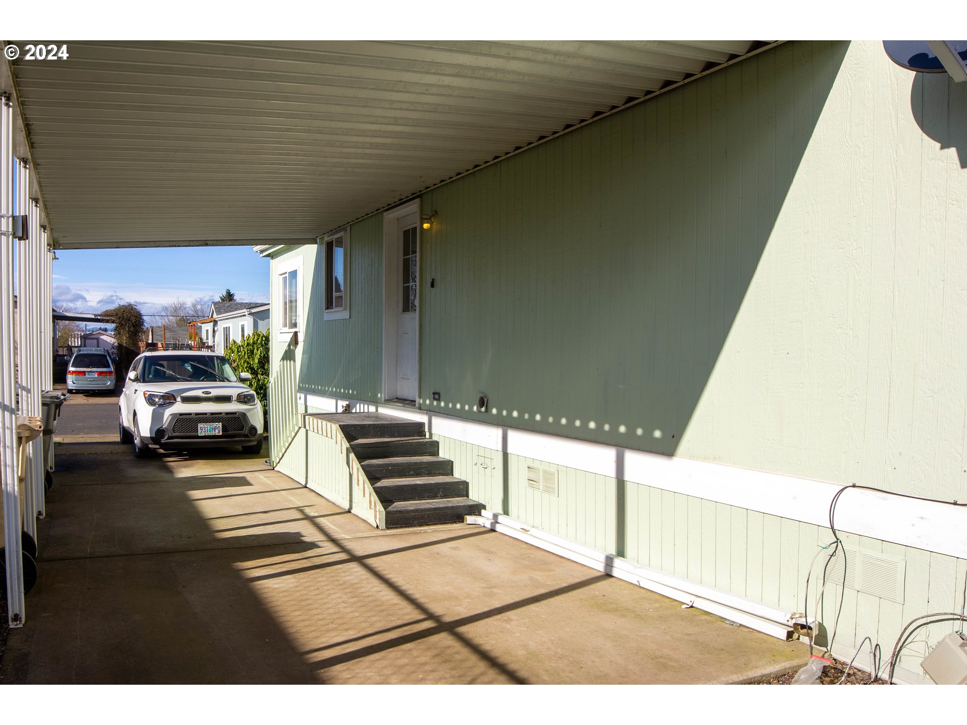 2151 Three Lakes Road Southeast, Unit 17 Albany, OR 97322 - Photo 21 of 34 a view of a patio with table and chairs