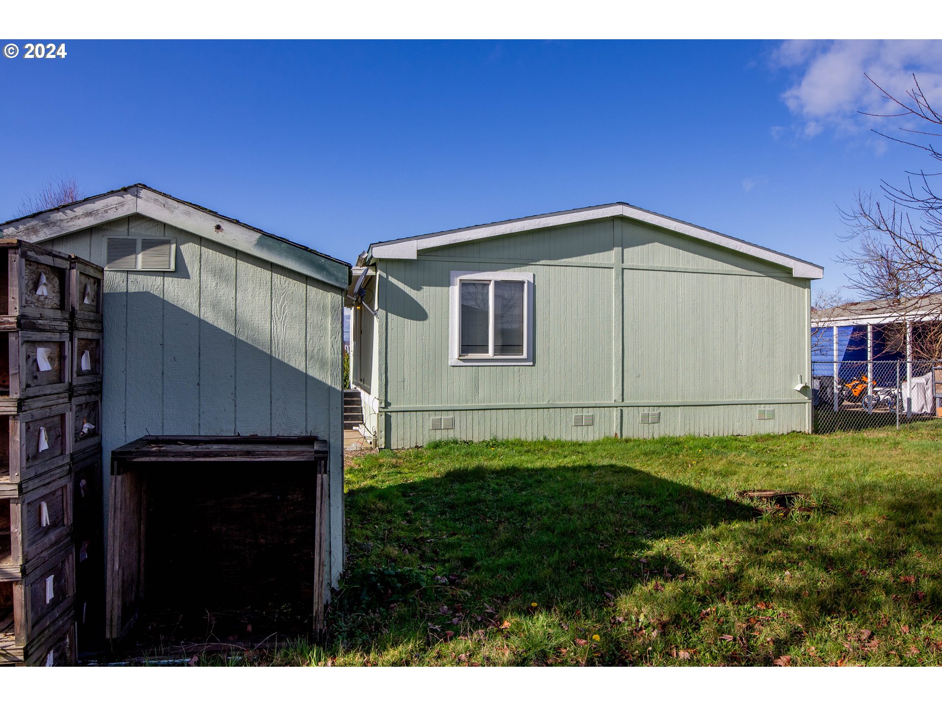 2151 Three Lakes Road Southeast, Unit 17 Albany, OR 97322 - Photo 23 of 34 a front view of a house with a yard