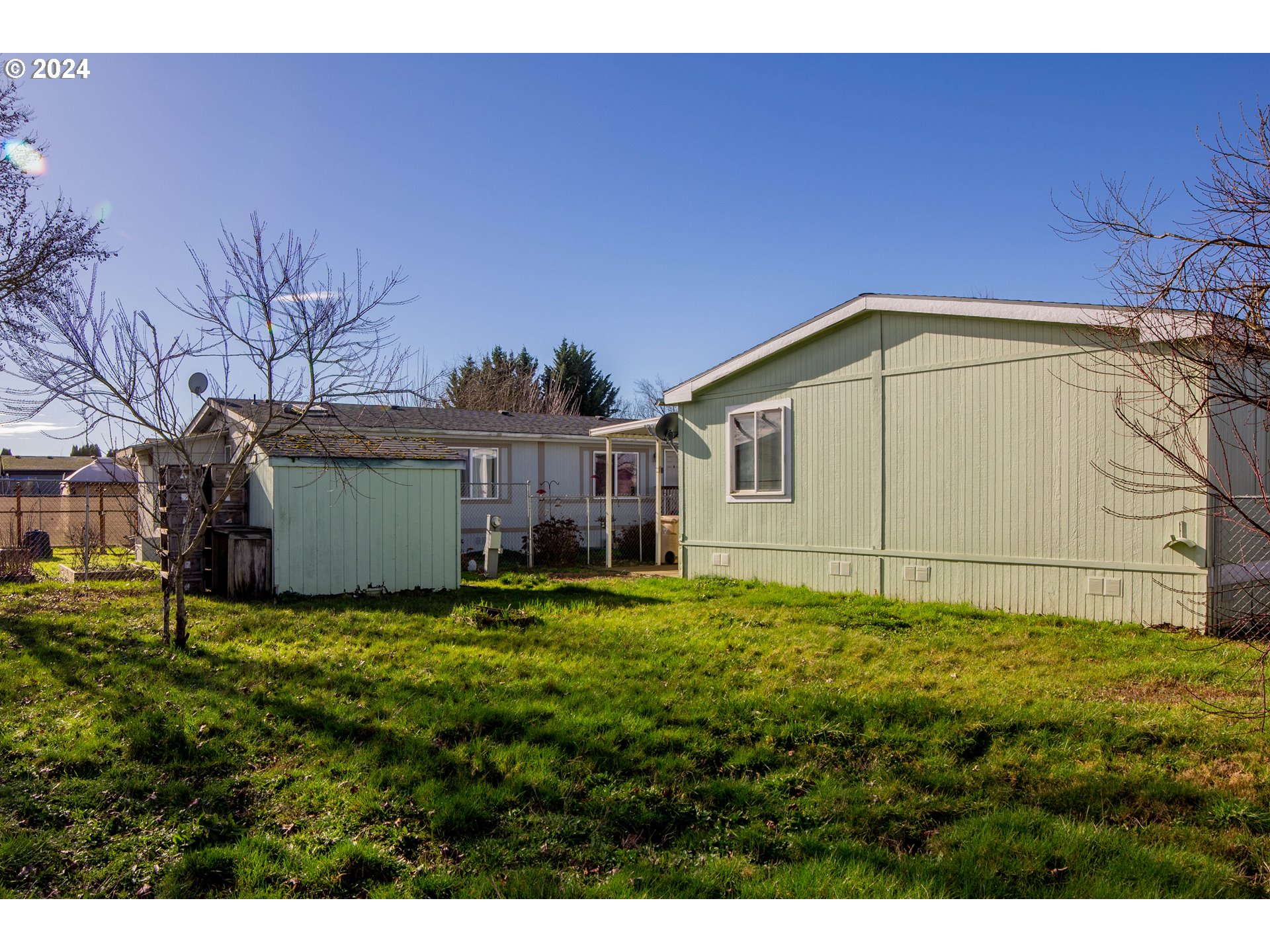 2151 Three Lakes Road Southeast, Unit 17 Albany, OR 97322 - Photo 24 of 34 a view of a house with a yard