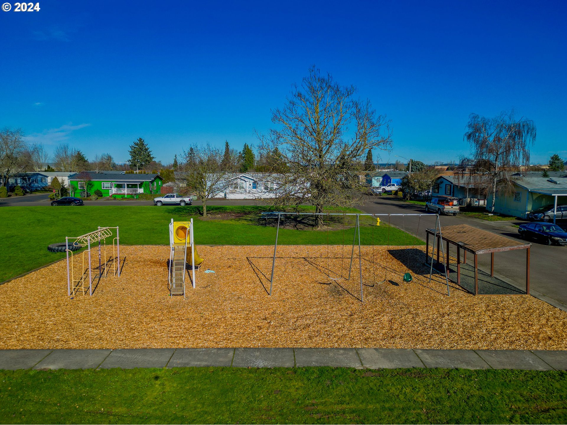 2151 Three Lakes Road Southeast, Unit 17 Albany, OR 97322 - Photo 30 of 34 a park view with a bench