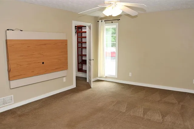 an empty room with windows