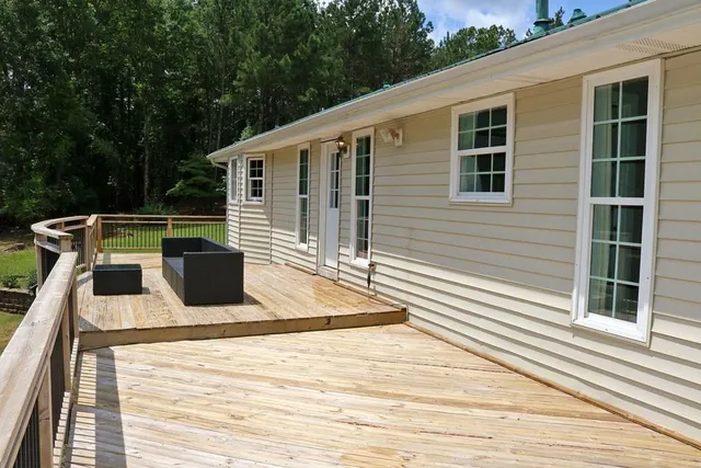 a view of a sitting area with swimming pool and sitting area
