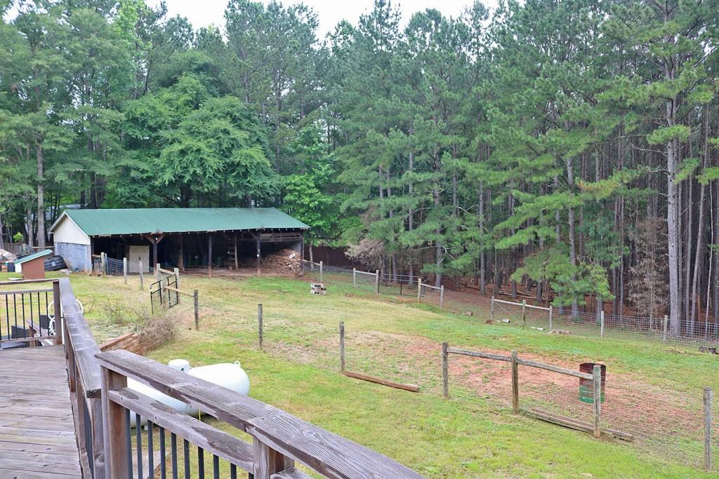 3129 Etchison Road Loganville, GA 30052 - Photo 37 of 58 a view of a sitting area with swimming pool and sitting area