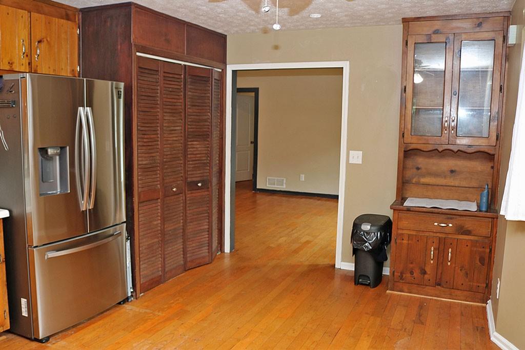 3129 Etchison Road Loganville, GA 30052 - Photo 7 of 58 a kitchen with stainless steel appliances a refrigerator and a stove