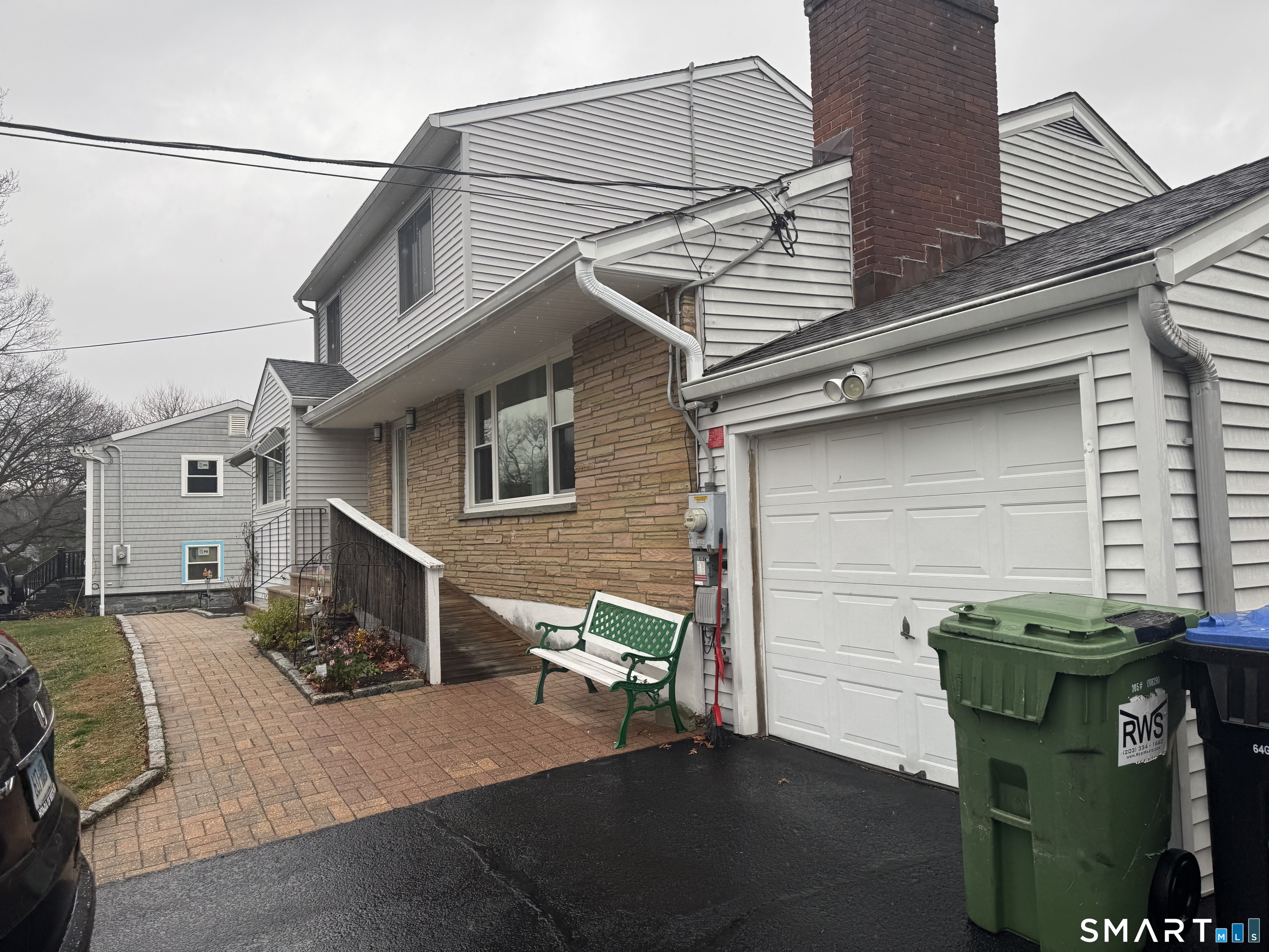 1880 Old Town Road Trumbull, CT 06611 - Photo 3 of 18 a view of a house with a patio