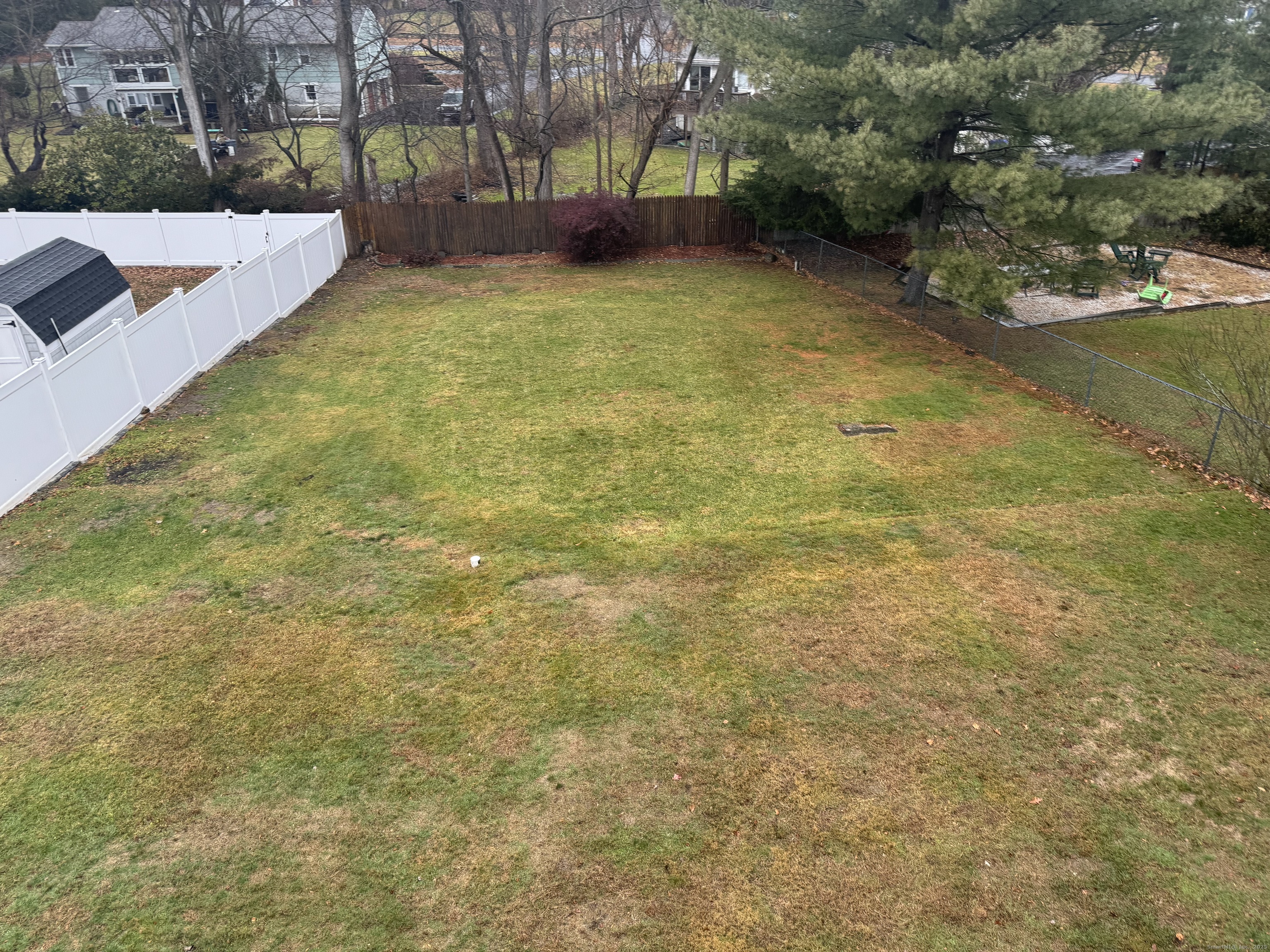 1880 Old Town Road Trumbull, CT 06611 - Photo 5 of 5 a view of a yard with a house and a trees