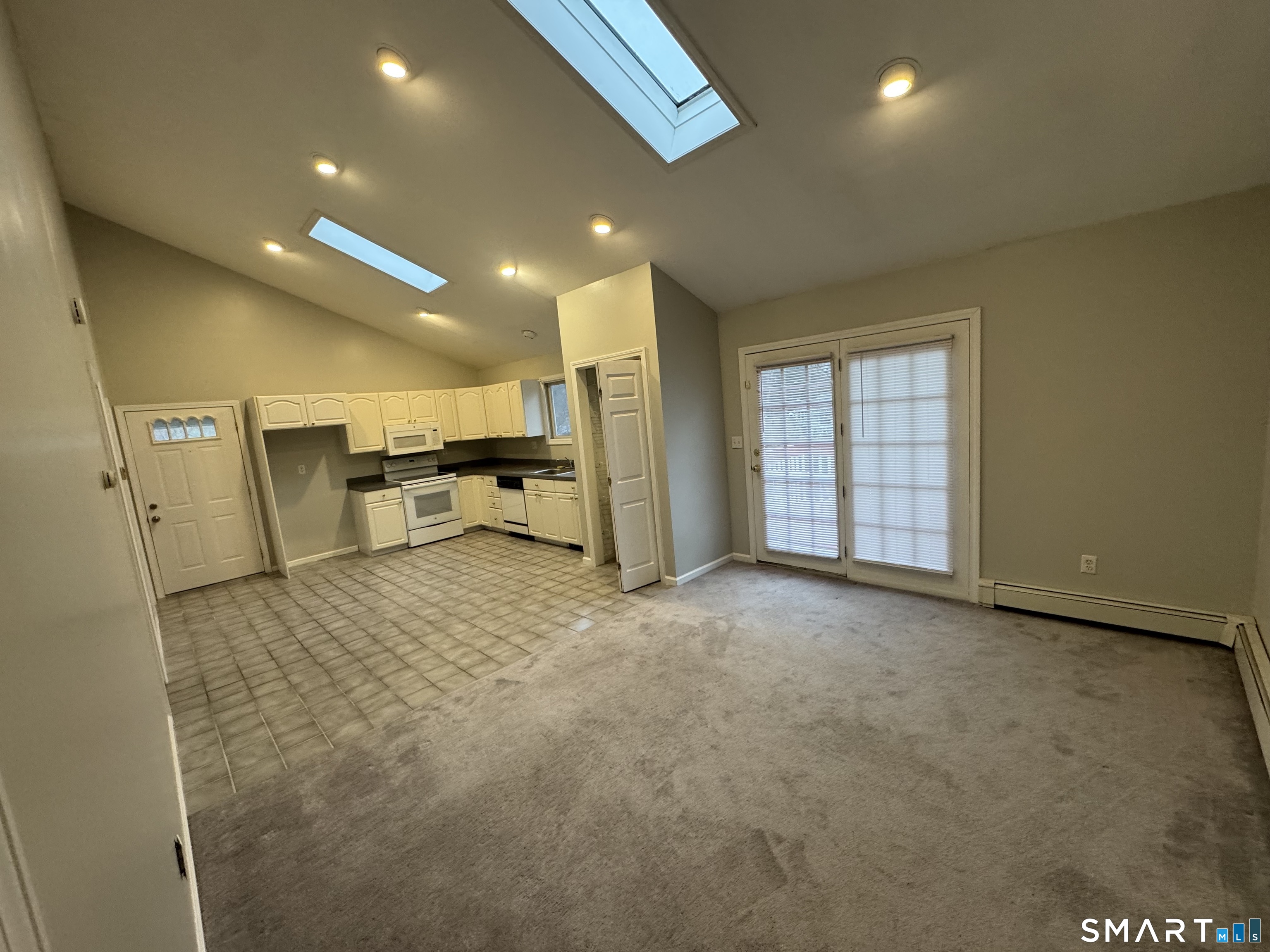 1880 Old Town Road Trumbull, CT 06611 - Photo 5 of 18 a view of a livingroom with furniture and a ceiling fan