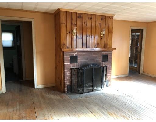 419 Plain Road Greenfield, MA 01301 - Photo 5 of 19 a view of a livingroom with a fireplace