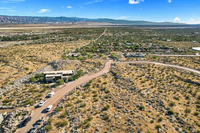 a view of a city with an ocean view