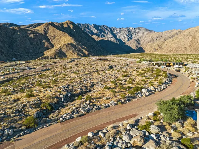 a view of a backyard of the house