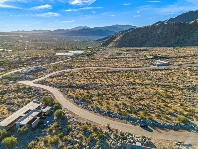 a view of swimming pool from a balcony