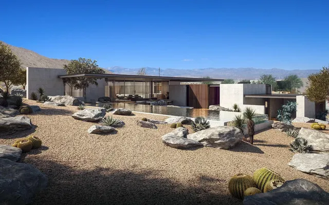 a view of a patio with couches chairs and potted plants