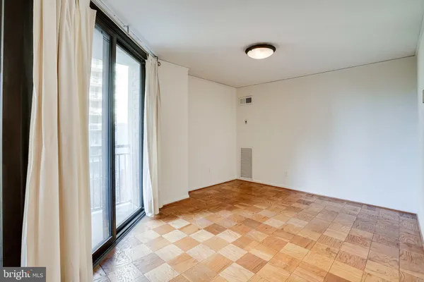 a kitchen with stainless steel appliances granite countertop a stove top oven a sink dishwasher and cabinets with wooden floor