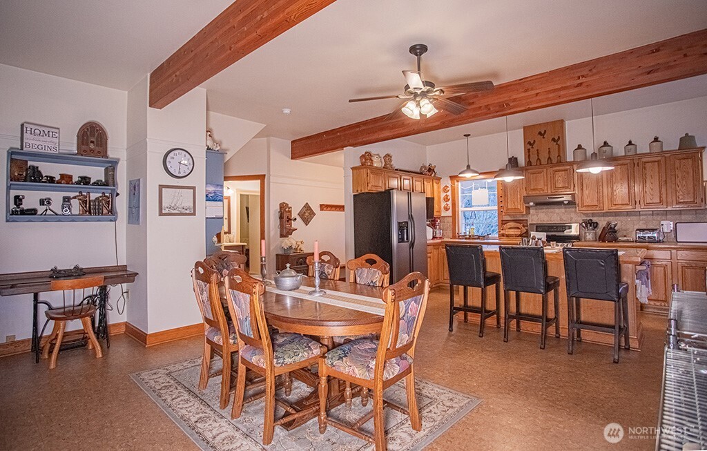 951 Bulman Road Southeast Port Orchard, WA 98366 - Photo 11 of 39 a view of a dining room with furniture