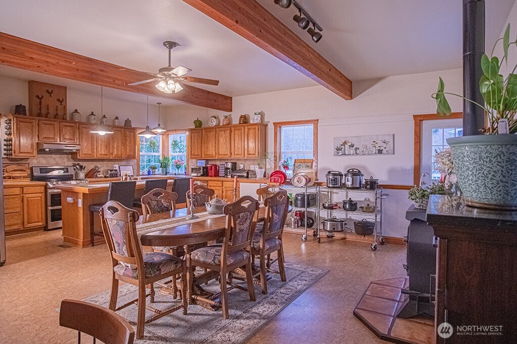 951 Bulman Road Southeast Port Orchard, WA 98366 - Photo 12 of 39 a view of a dining room with furniture