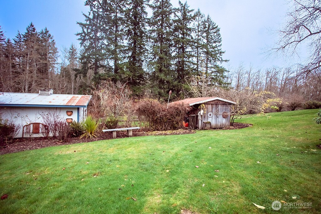 951 Bulman Road Southeast Port Orchard, WA 98366 - Photo 36 of 39 a view of a chairs in a backyard