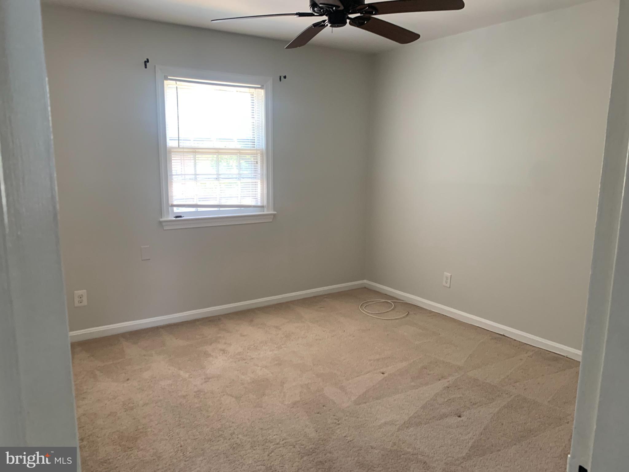 1760 East W Highway Silver Spring, MD 20910 - Photo 16 of 21 an empty room with a window
