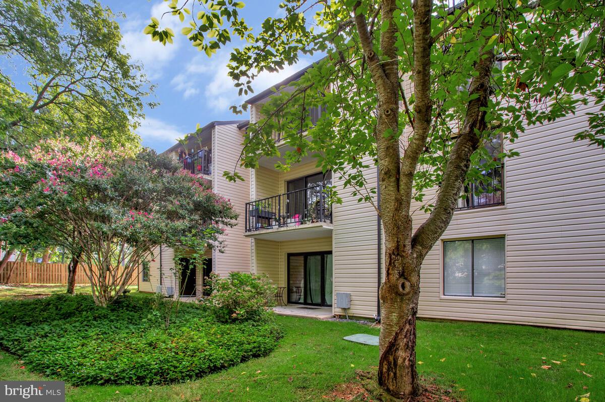2574 Riva Road, Unit 19A Annapolis, MD 21401 - Photo 30 of 35 a front view of a house with garden