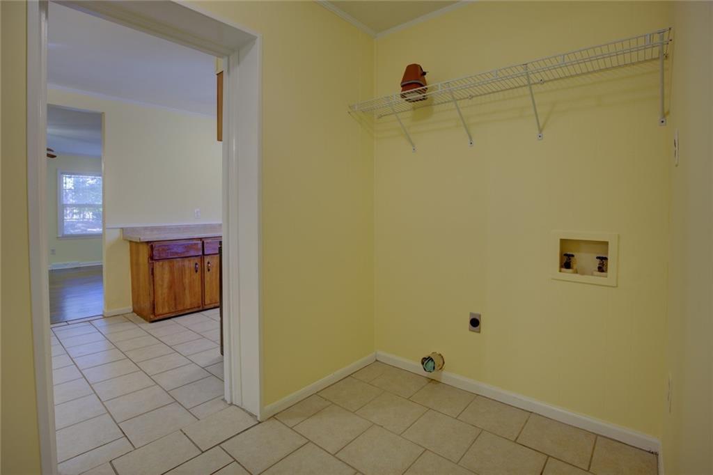9174 Flat Shoals Road Southwest Covington, GA 30014 - Photo 14 of 25 a view of utility room
