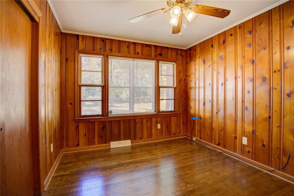 9174 Flat Shoals Road Southwest Covington, GA 30014 - Photo 22 of 25 a view of an empty room with a window and bathroom