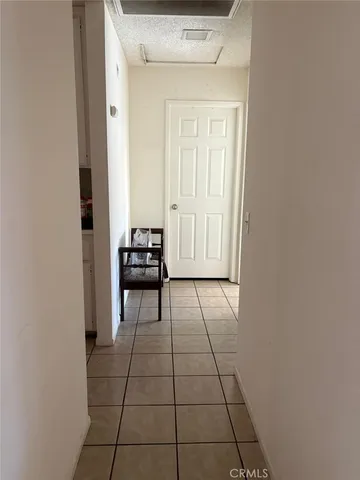 a view of a livingroom with furniture and entryway