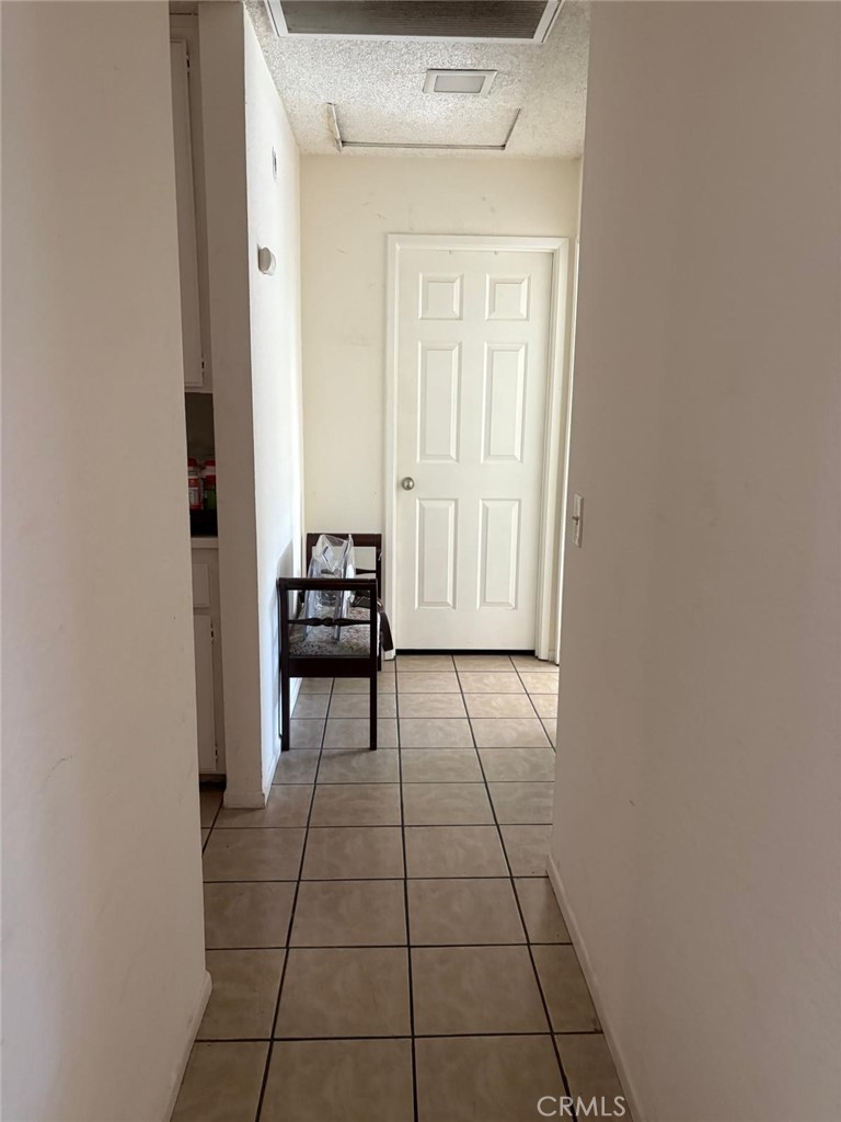 9442 Placer Street Rancho Cucamonga, CA 91730 - Photo 20 of 40 a view of a livingroom with furniture and entryway