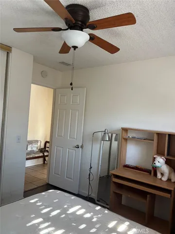 a view of room with a hallway