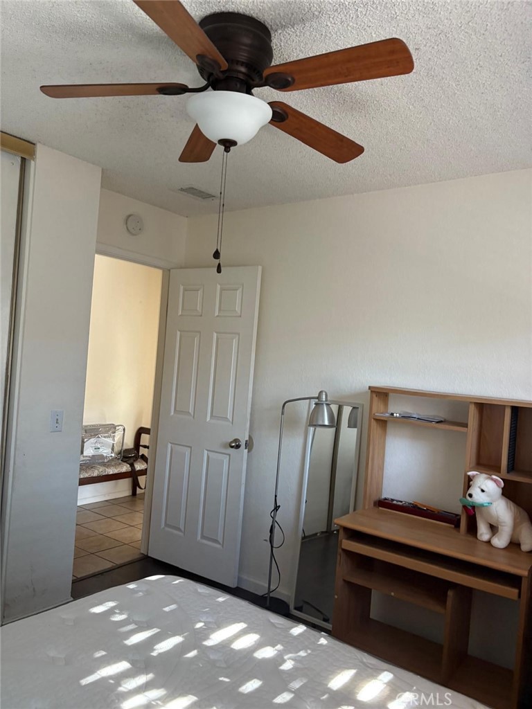 9442 Placer Street Rancho Cucamonga, CA 91730 - Photo 25 of 40 a view of room with a hallway