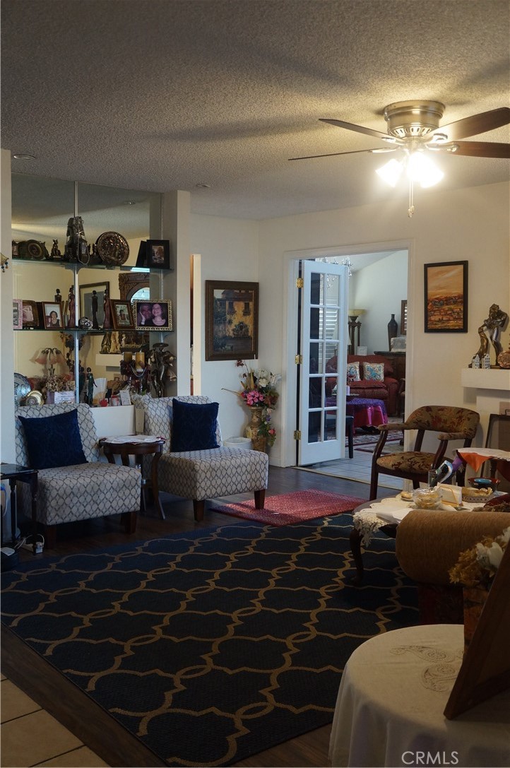 9442 Placer Street Rancho Cucamonga, CA 91730 - Photo 4 of 40 a living room with furniture and a rug