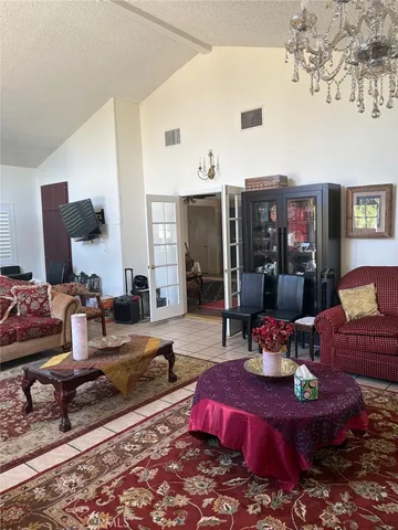 a living room with furniture and a rug
