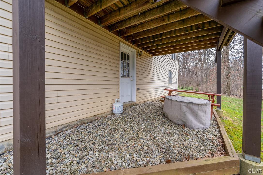 4102 Mink Road Emmaus, PA 18049 - Photo 16 of 19 basement door leads to stone patio