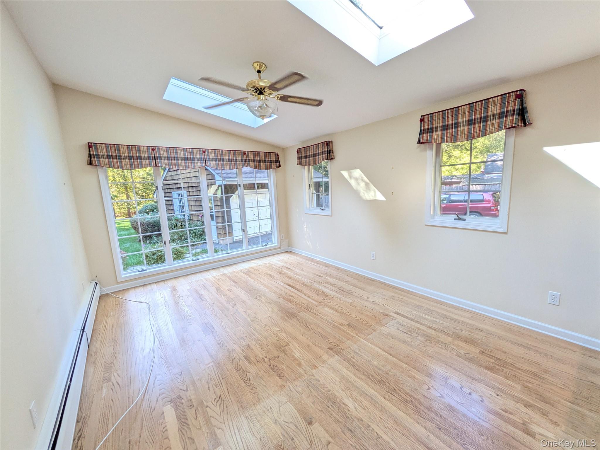31 Mile Road Suffern, NY 10901 - Photo 13 of 32 a view of an empty room with wooden floor and a window