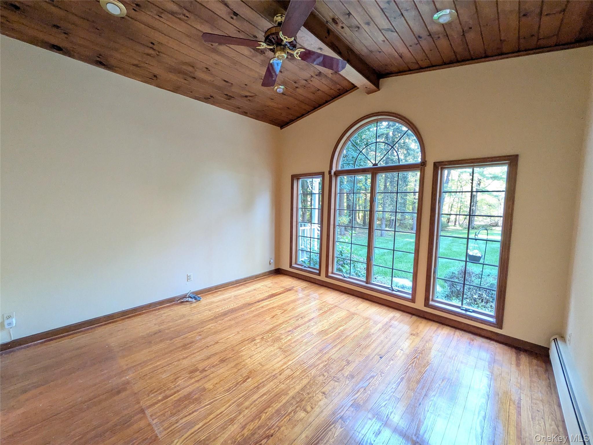 31 Mile Road Suffern, NY 10901 - Photo 14 of 32 a view of an empty room with a window and wooden floor