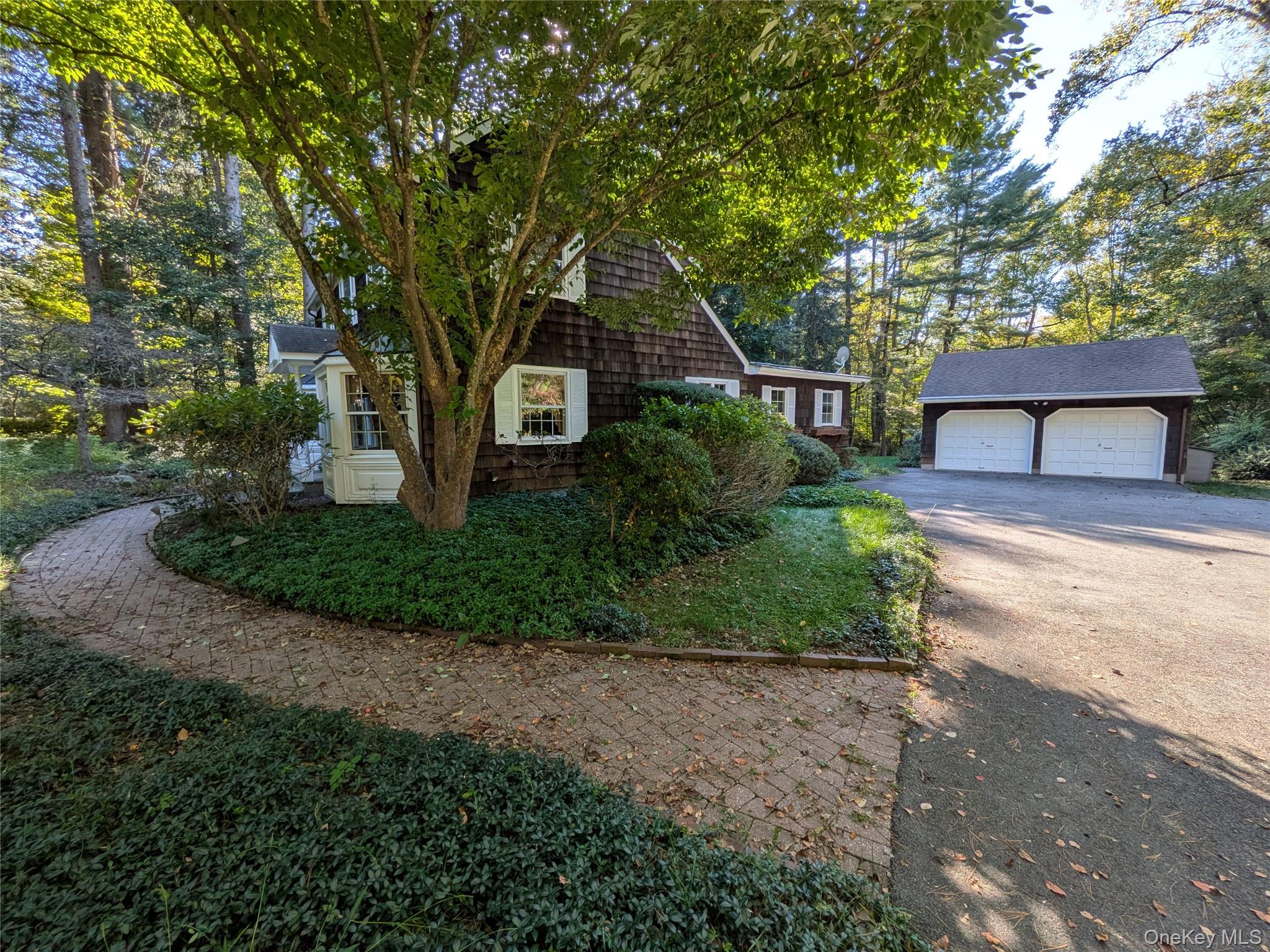 31 Mile Road Suffern, NY 10901 - Photo 2 of 32 a front view of a house with garden