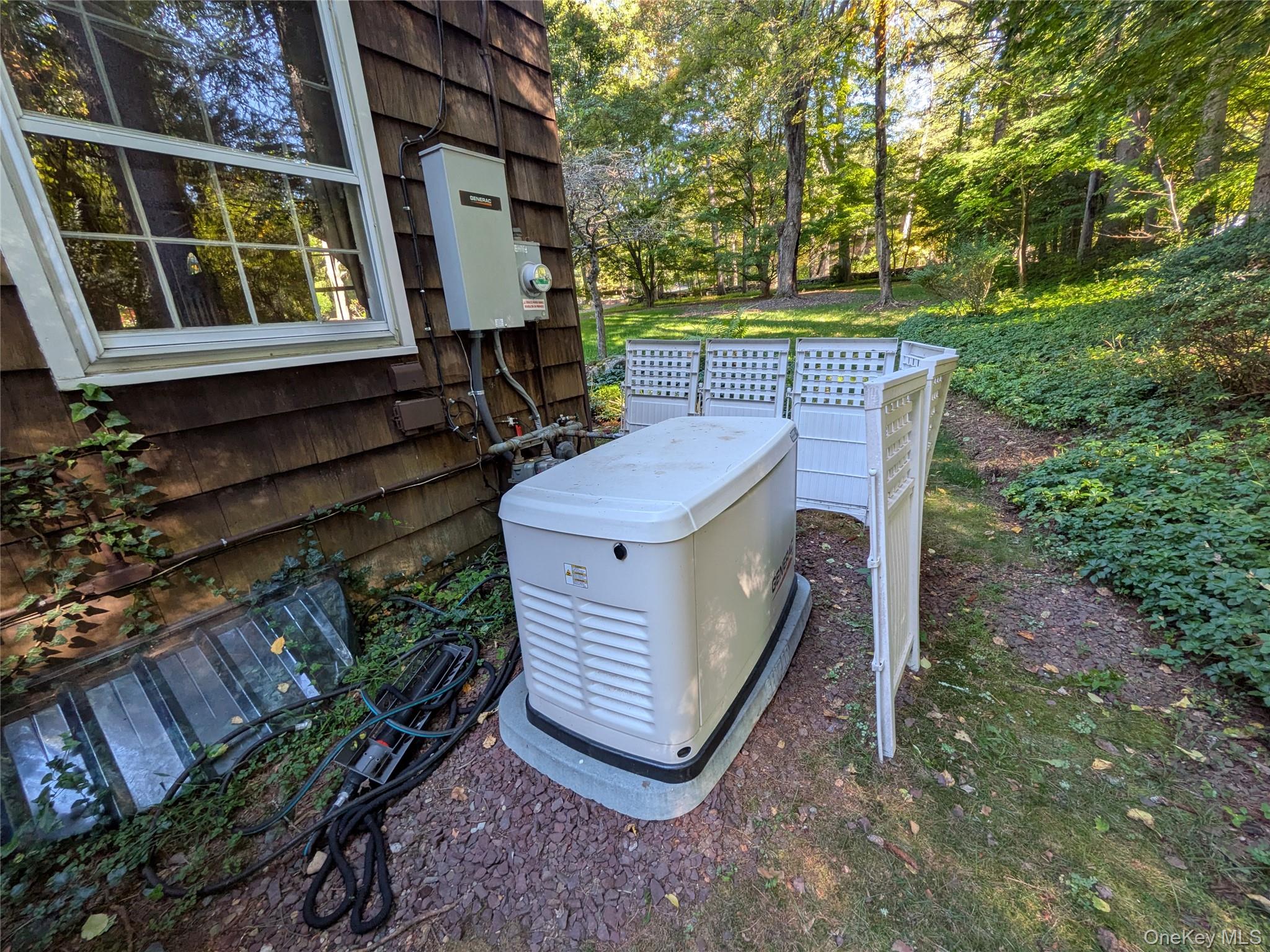 31 Mile Road Suffern, NY 10901 - Photo 29 of 32 a view of a chairs and table in the backyard