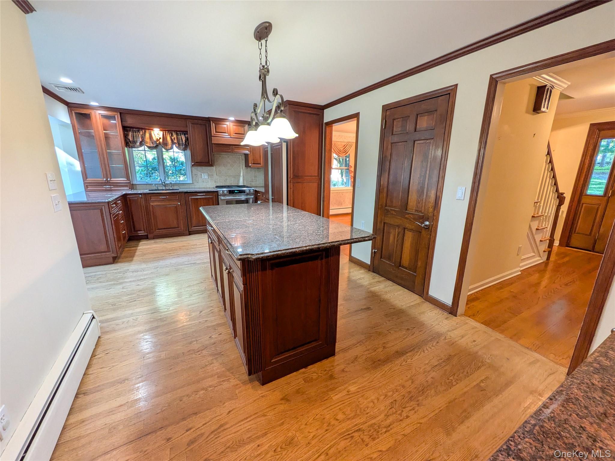 31 Mile Road Suffern, NY 10901 - Photo 10 of 32 a kitchen with stainless steel appliances granite countertop a refrigerator a sink and a stove
