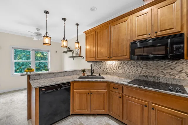 a close view of a sink a faucet and a sink