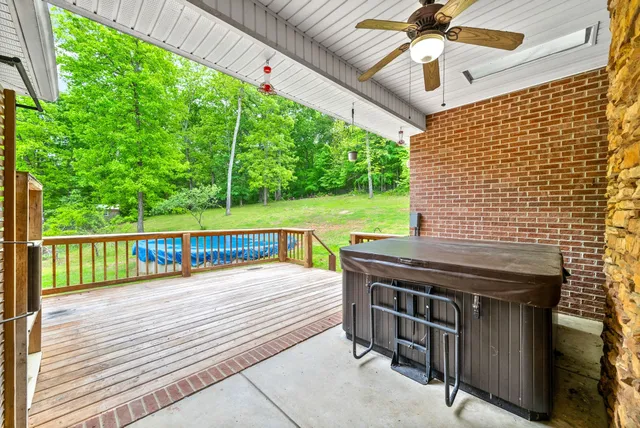 a view of a house with a yard and sitting area