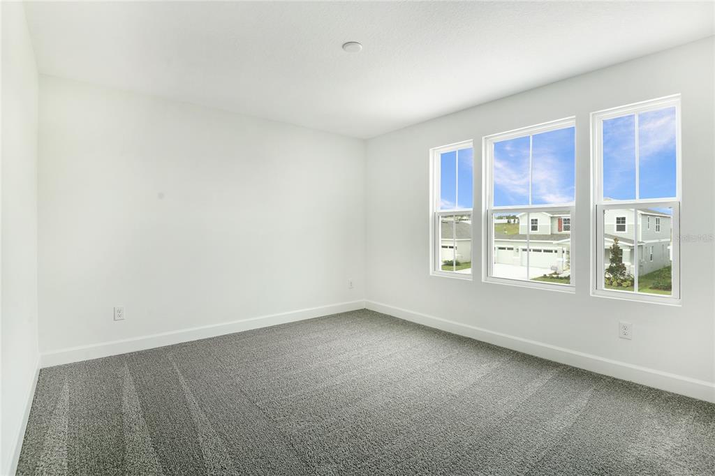 158 Waterstone Loop Tavares, FL 32778 - Photo 14 of 20 an empty room with a window