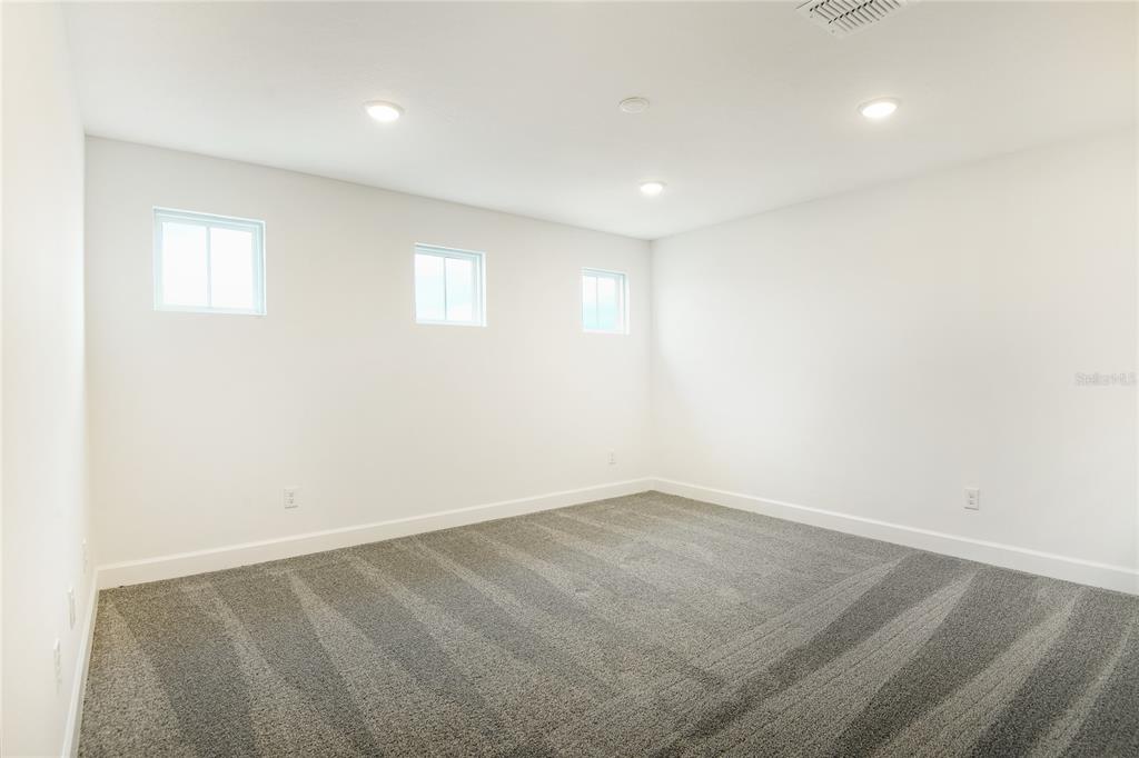 158 Waterstone Loop Tavares, FL 32778 - Photo 10 of 20 an empty room with a empty space and window