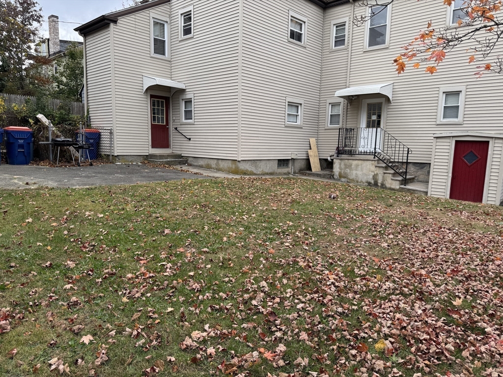 148 Maxfield Street, Unit 3 New Bedford, MA 02740 - Photo 21 of 21 a view of a house with backyard