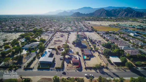 an aerial view of residential house with outdoor space and river