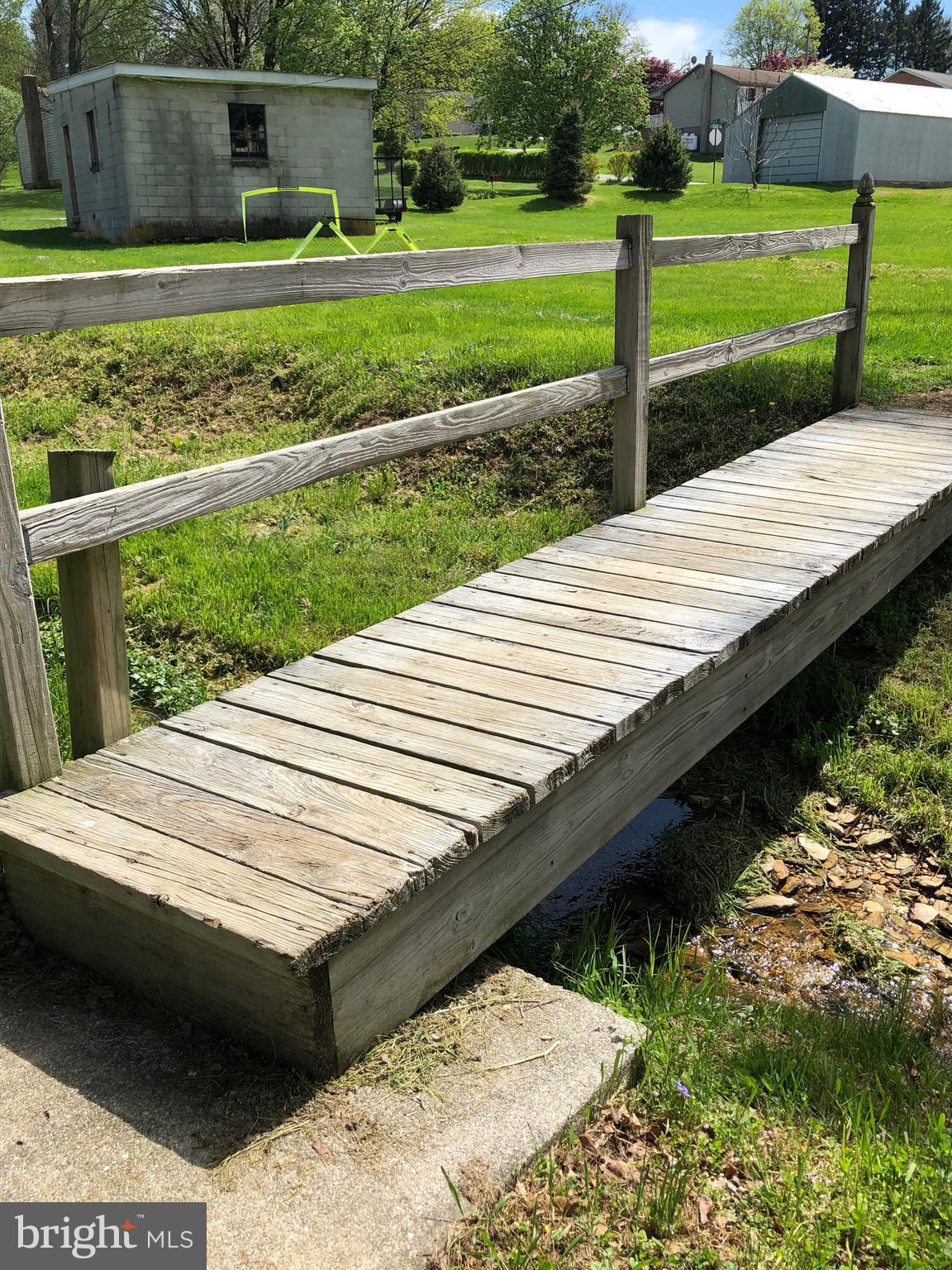 10 West Hanover Street Spring Grove, PA 17362 - Photo 4 of 22 Charming bridge to take you to more yard space