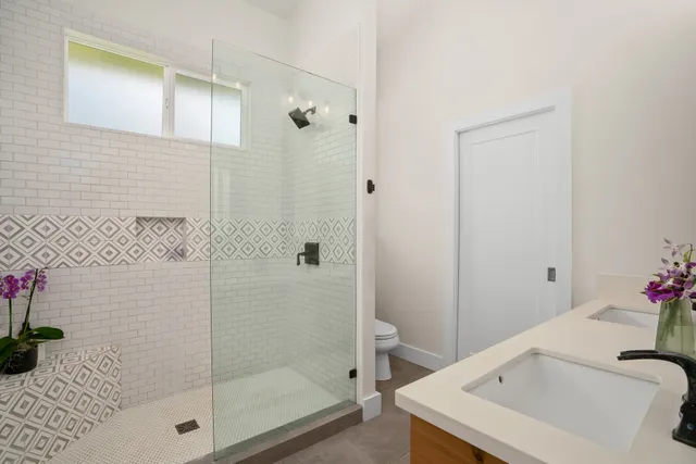a bathroom with a sink and a shower